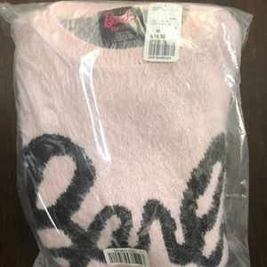 Barbie sweater in bag